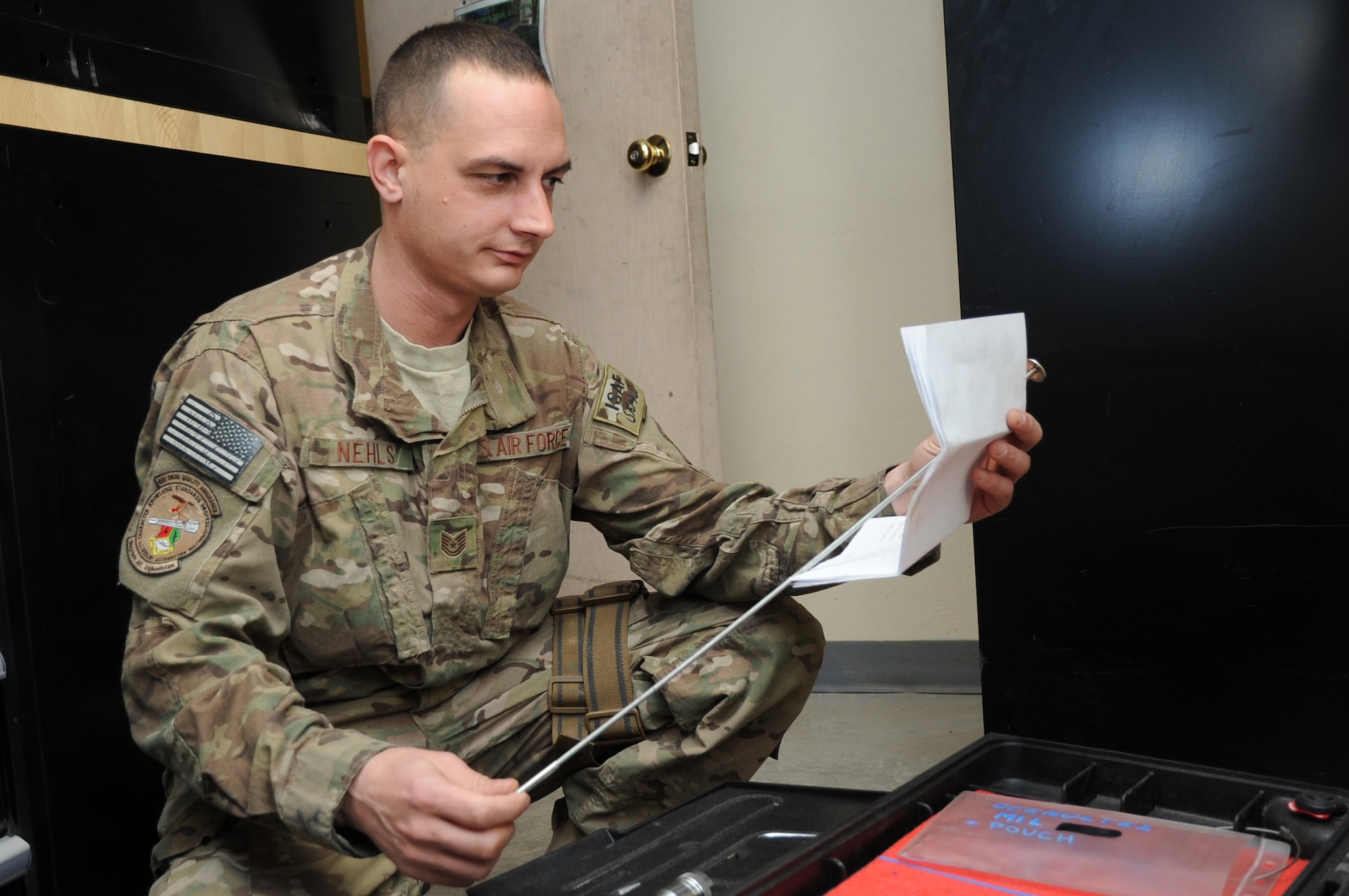 Tech. Sgt. Joshua Nehls, 455th Expeditionary Maintenance Group quality assurance chief inspector, inspects tools for serviceability at the Crash Recovery shop on Bagram Airfield, Afghanistan, Feb. 28, 2013. Nehls is responsible for validating the quality of maintenance performed on the A-10 Thunderbolt II aircraft. (U.S. Air Force photo/Staff Sgt. David Dobrydney)