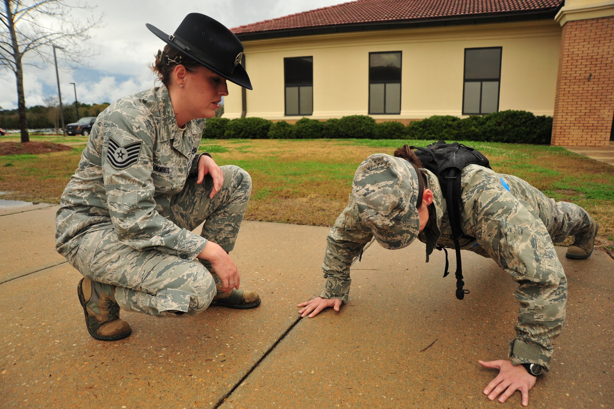 Tech. Sgt. Leslie A. Cummings of Corona, Calif., encourages an officer candidate at the U.S. Air Force Officer Training School, February 13, 2013. Cummings is the Air National Guard’s first and only female Military Training Instructor, and was the first Air National Guardsman to be named the Air University NCO of the Year. (USAF Photo by SrA Christopher Stoltz/RELEASED)
