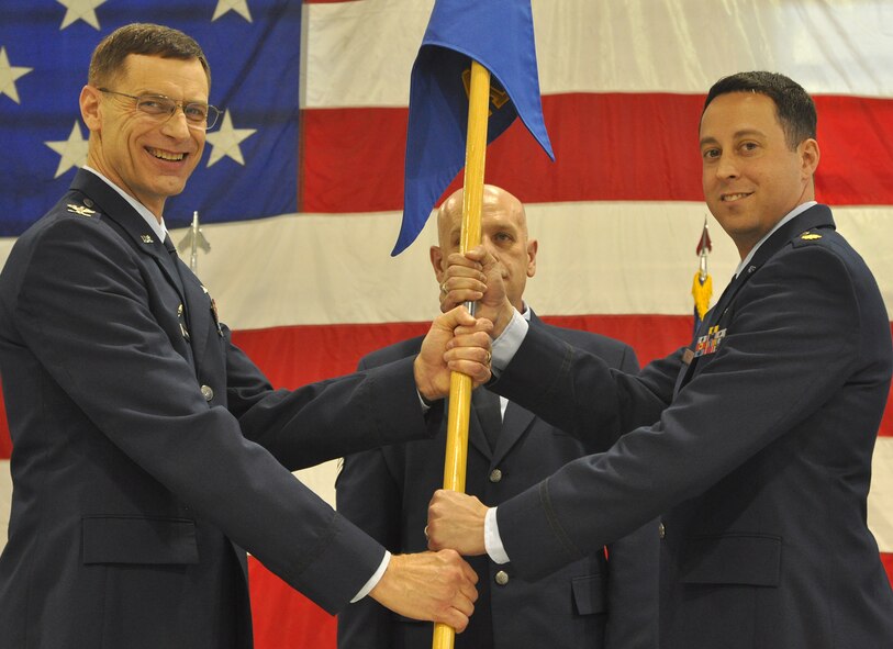 Air Force Reserve Col. James Van Housen, 302nd Maintenance Group commander, presents the 302nd Aircraft Maintenance Squadron’s newest commander, Maj. John Drain, to Airmen of the group March 2 during an assumption of command ceremony at Peterson Air Force Base, Colo. “Your reputation precedes you,” Drain said, “and the 302nd AMXS is synonymous with maintenance excellence. I’m proud to be here and proud to serve with you all and my goal is to ensure you are trained, ready and equipped to fulfill our combat mission.” Van Housen presided over two assumptions of command ceremonies for the 302nd MXG, including one for the 302nd Maintenance Operation Flight’s incoming commander, Capt. Michael Allen. Drain, a former enlisted avionics technician, has served in a number of officer billets, including F-22 maintenance at Tyndall AFB, Fla., and the commander of the AF Reserve’s 934th MOF in Minneapolis, Minn. Allen, also a prior enlisted Airman in security forces, takes on the leadership role of the 302nd MOF after serving within the 302nd Airlift Wing since March 2009. The 302nd MXG is the parent organization to both the 302nd AMXS and MOF. (U.S. Air Force photo/Tech. Sgt. Stephen J. Collier)