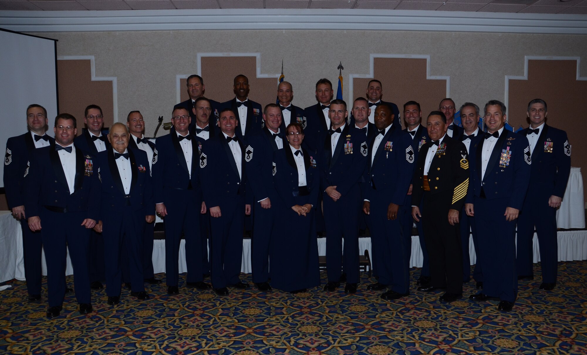 Chiefs from both the active-duty and reserve Air Force components her on the Space Coast, take a group photo to commemorate the 2013 Chief Master Sgt. Recognition Ceremony in Cocoa Beach, Marc. 2. (U.S. Air Force photo/Senior Airman Natasha Dowridge)