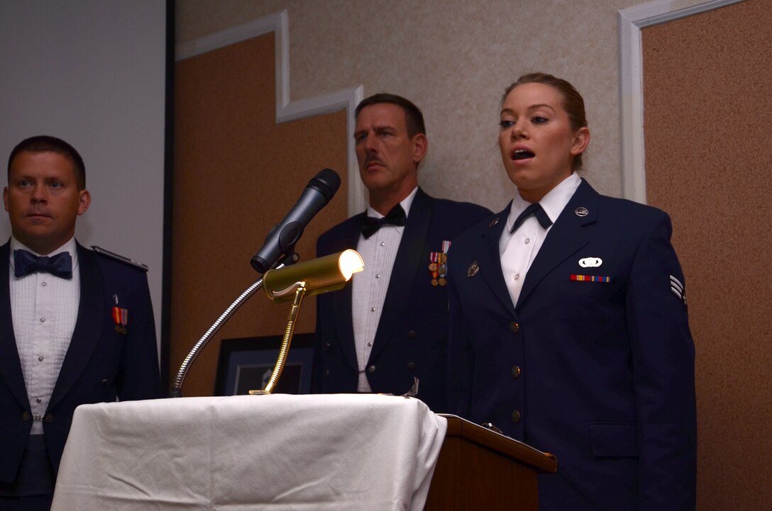 Senior Airman Caitlin Novell, 920th Security Forces Squadron sings the national anthem at the 2013 Chief Master Sergeant Recognition Ceremony in Cocoa Beach, Fla., Mar. 2. Three chief-selects and one chief were recognized in the ceremony. (U.S. Air Force photo/Senior Airman Natasha Dowridge)