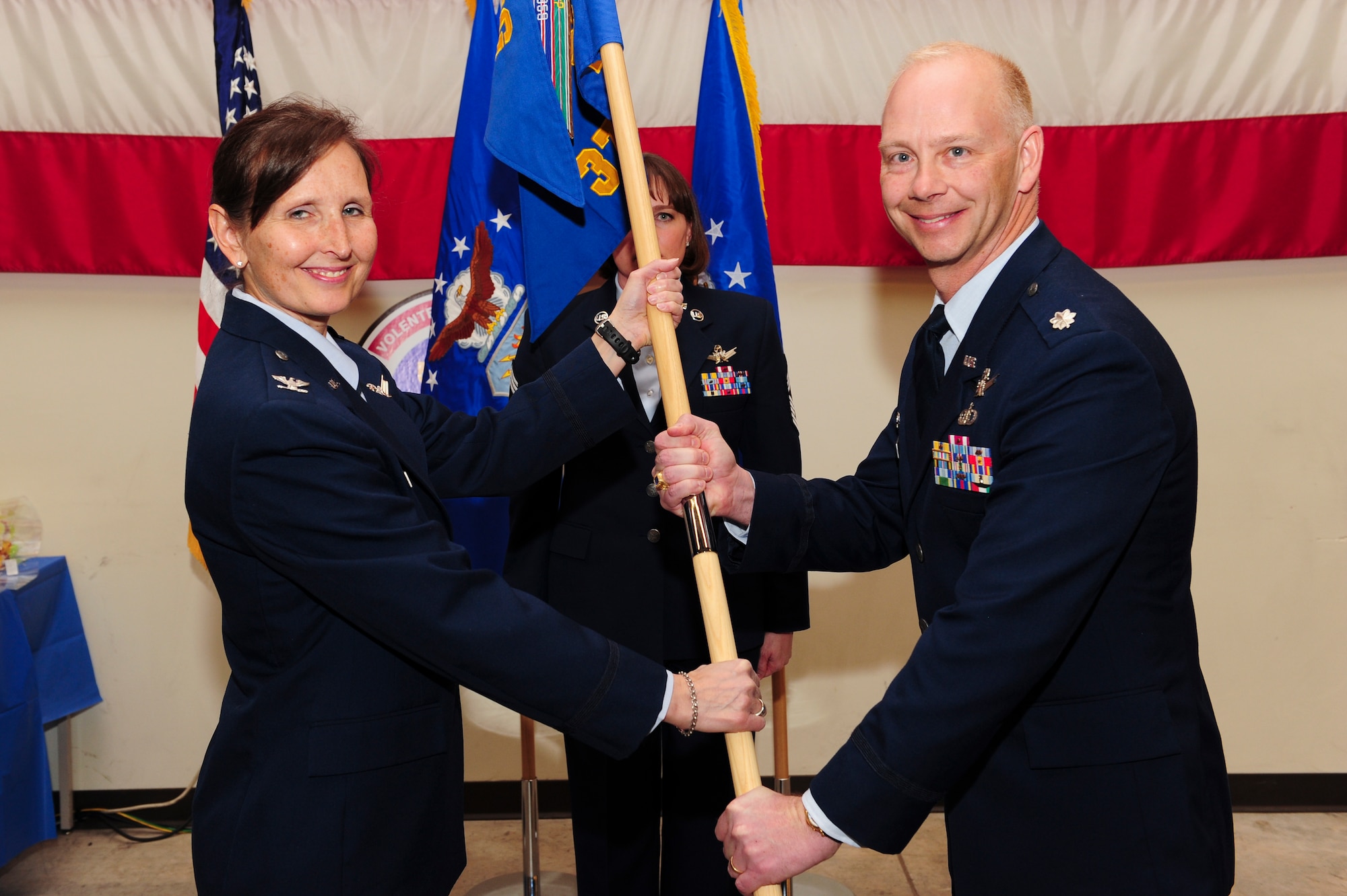 U.S. Air Force Col. Traci L. Kueker-Murphy, 310th Operations Group commander, hands the 379th Space Range Squadron guidon to U.S. Air Force Lt. Col. Clifton D. Stargardt in Colorado Springs, Colo., Mar. 3, 2013. Stargardt assumed command during the official activation ceremony of the 379 SRS. 
(U.S. Air Force photo by Tech. Sgt. Nicholas B. Ontiveros/Released)