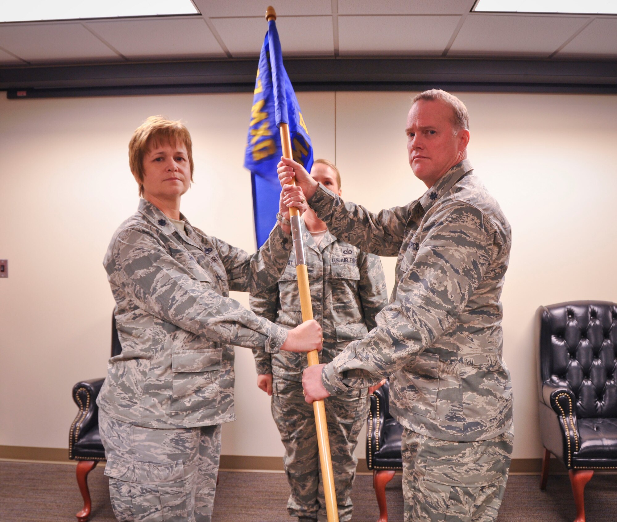 MACDILL AIR FORCE BASE, Fla. – Lieutenant Col. David Farmer assumed command of the 927th Military Operations Flight from Lt. Col. Dorneen Shipp, commander of the 927th Maintenance Group, during a ceremony here March 2, 2013.  He relinquished command of the 927th Aircraft Maintenance Squadron earlier in the ceremony.  (Official U.S. Air Force photo/Staff Sgt. Shawn Rhodes)