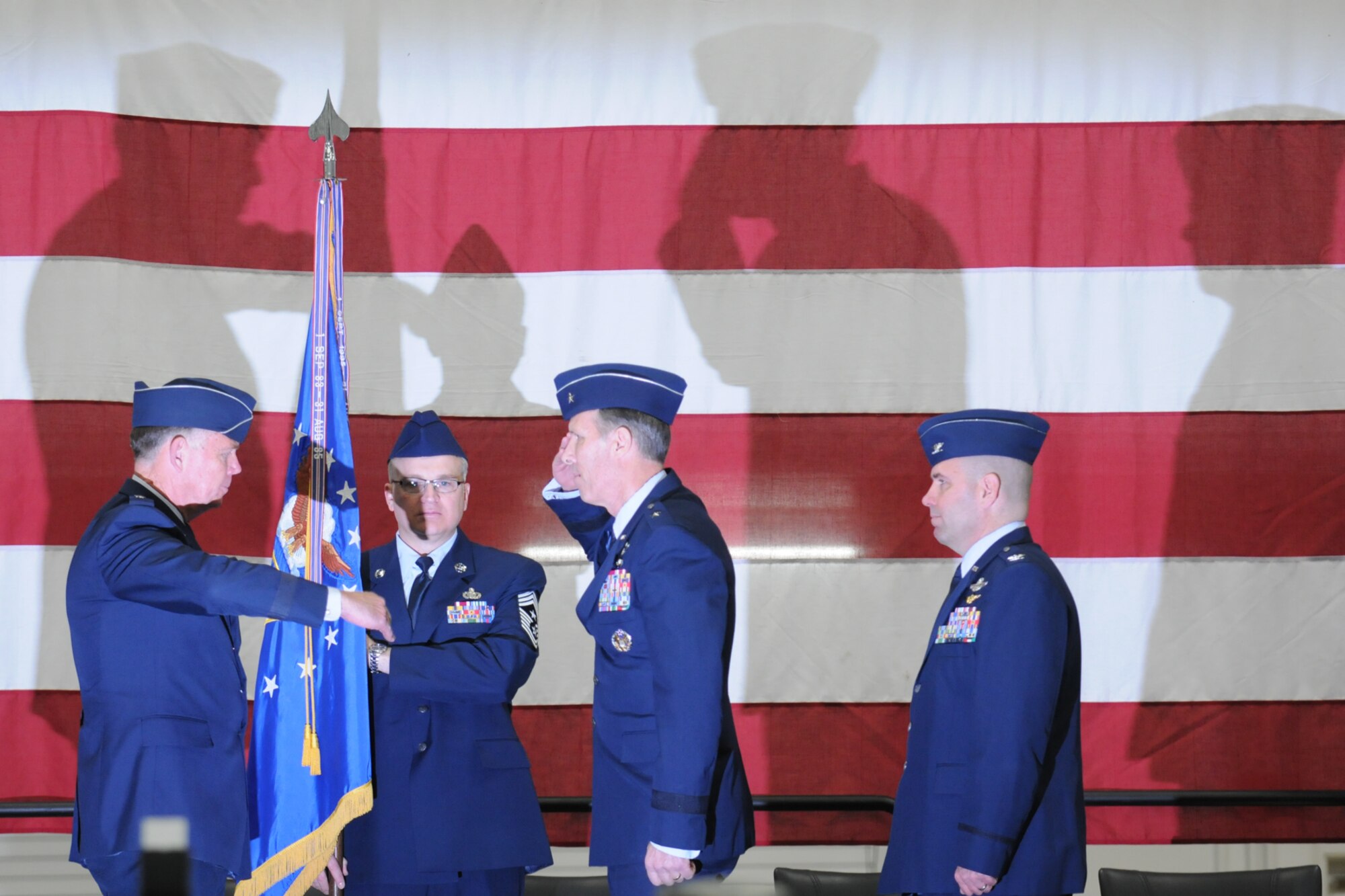 YOUNGSTOWN AIR RESERVE STATION, Ohio – A change of command ceremony March 2, 2013 here, marked the change of command of the 910th Airlift Wing from U.S. Air Force Reserve Brig. Gen. Brian Dominguez to Col. James D. Dignan. Dignan comes to the 910th AW from Joint Base Lewis-McChord, Wash., where he served as commander of the 447th Operations Group. U.S. Air Force photo by Tech. Sgt. Matt Matulka