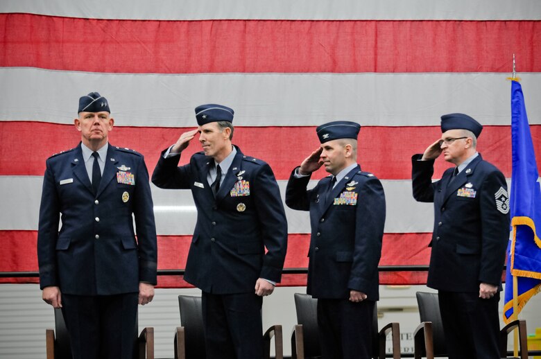 YOUNGSTOWN AIR RESERVE STATION, Ohio – U.S. Air Force Reserve Maj. Gen. Wallace W. "Wade" Farris, commander of 22nd Air Force, prepares for a change of command ceremony March 2, 2013 here, while 910th Airlift Wing interim commander, Brig. Gen. Brian Dominguez, incoming 910th AW commander Col. James D. Dignan and 910th AW command chief Troy K. Rhoades salute him. Dignan comes to the 910th AW from Joint Base Lewis-McChord, Wash., where he served as commander of the 447th Operations Group. U.S. Air Force photo by Tech. Sgt. Matt Matulka