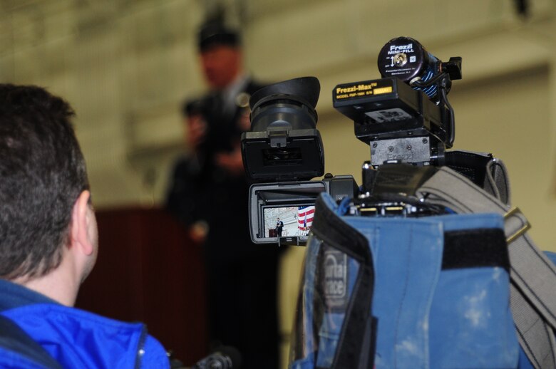 YOUNGSTOWN AIR RESERVE STATION, Ohio – Local media descends on Youngstown Air Reserve Station to cover a change of command ceremony March 2, 2013 here. U.S. Air Force Reserve Col. James Dignan assumed command of the 910th Airlift Wing from interim wing commander, Brig. Gen. Brian Dominguez. U.S. Air Force photo by Senior Airman Ron Dombkowski