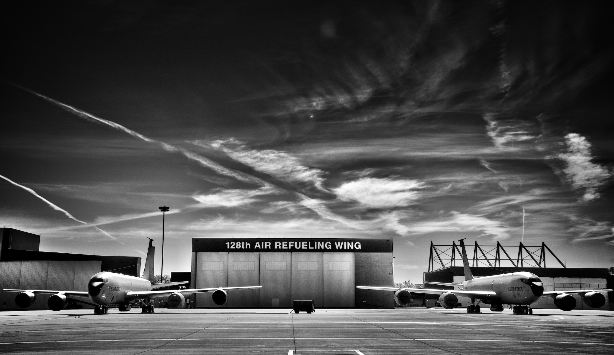 A pair of KC-135 Stratotankers rest idle on the ramp at the 128th Air Refueling Wing in Milwaukee. The air refueling tankers, from the Milwaukee Air Guard unit, were one of many current and vintage aircraft participating in the Milwaukee Air and Water Show, held Aug. 11 and 12 at Milwaukee’s lake front.  (U.S. Air Force photo by Tech. Sgt. Thomas J. Sobczyk/Released)