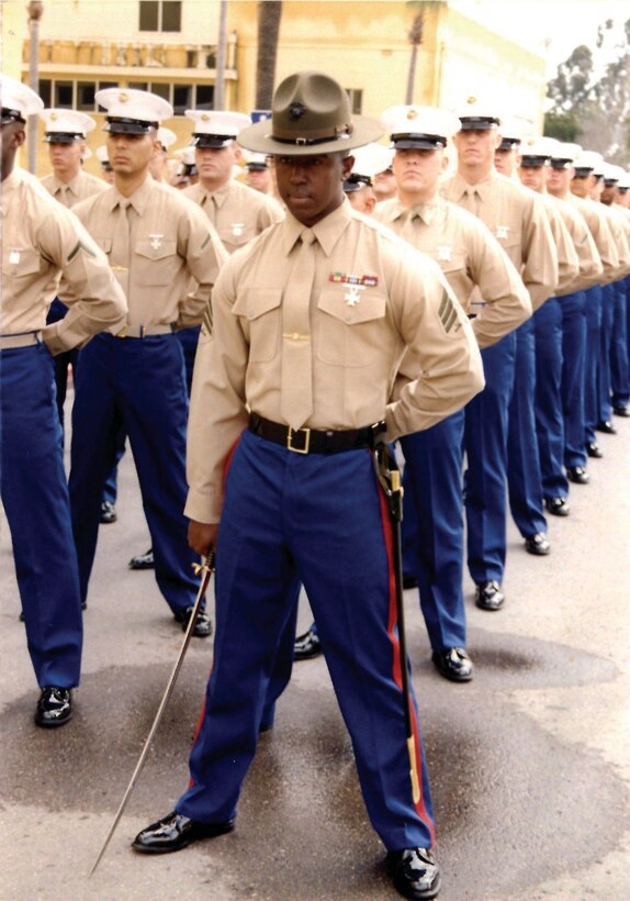 Sergeant Lorenzo Lacy leads his platoon as a senior drill instructor on Marine Corps Recruit Depot, San Diego. Lacy picked up staff sergeant meritoriously on the drill field. 