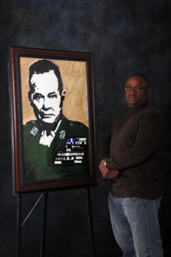 Anthony Plummer, a maintenance worker with Installation and Logistics Division on Marine Corps Logistics Base Barstow, stands with a painting of Lt. Gen. Lewis 'Chesty' Puller he donated to the MCLB Barstow Historical Gallery, Feb. 26. While not at work


