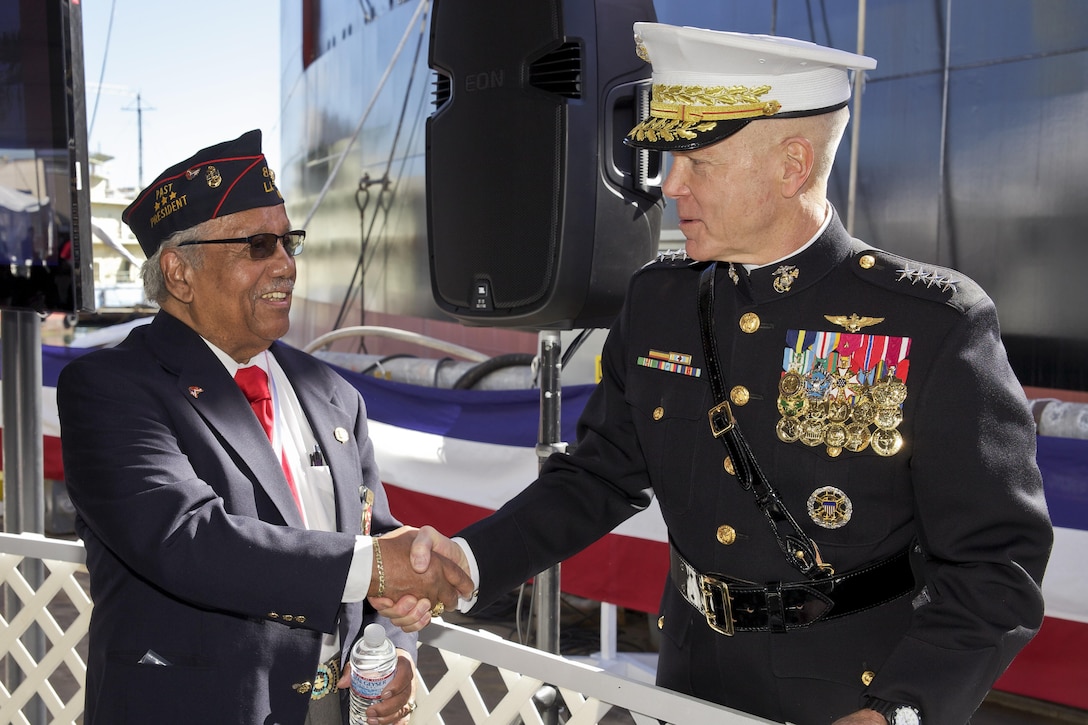 The 35th commandant of the Marine Corps, General James F. Amos, greets guests at the United States Naval Ship Montoford Point Christening Ceremony at General Dynamics NASSCO in San Diego, Ca, March. 2, 2013. (U.S. Marine Corps photo by Sgt. Mallory S. VanderSchans)(RELEASED)
