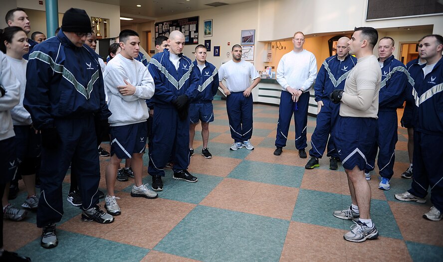 Tech Sgt. Justin Mullins, 51st Security Forces Squadron defender, speaks to a group of Airmen from the 51st LRS and 51st Security Forces Squadron before running in a 5K at Osan Air Base, Republic of Korea, March 2, 2013. The 5K was held in remembrance of two Airmen, an LRS member and SFS member, who were killed at the Frankfurt Airport in Germany in 2011. Mullins was the supervisor of Senior Airman Alden while stationed at Ramstein Air Base. (U.S. Air Force photo/Staff Sgt. Sara Csurilla)