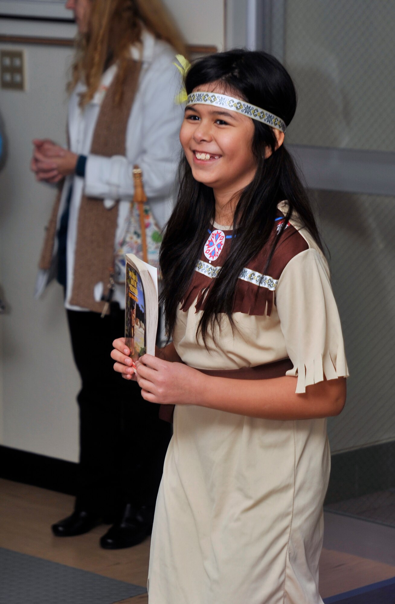 A Cummings Elementary School fifth-grader dressed up as Pocahontas, from the book “Pocahontas and the Strangers” by Clyde Bulla, takes part in a character parade at Misawa Air Base, Japan, March 1, 2013. Students from Cummings dressed up as a character from a book they read to commemorate Read Across America Week.  (U.S. Air Force photo by Airman 1st Class Zachary Kee)