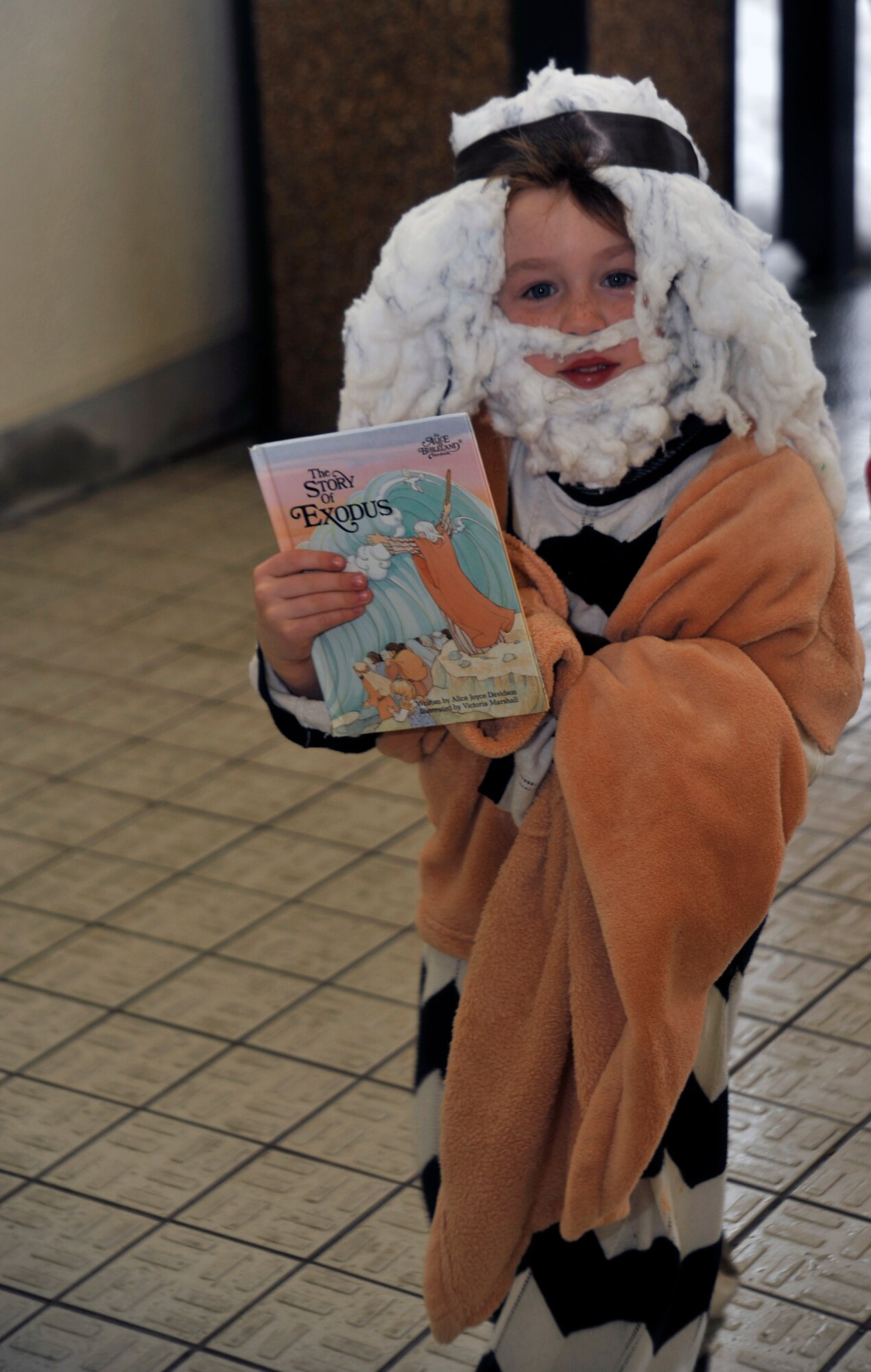 A Cummings Elementary School first-grader dressed up as Moses, from the book “The Story of Exodus” by Alice Davidson, poses for a photo during a character parade at Misawa Air Base, Japan, March 1, 2013. Read Across America, in its 16th year, is a national event held to teach children the importance of reading. (U.S. Air Force photo by Airman 1st Class Zachary Kee)