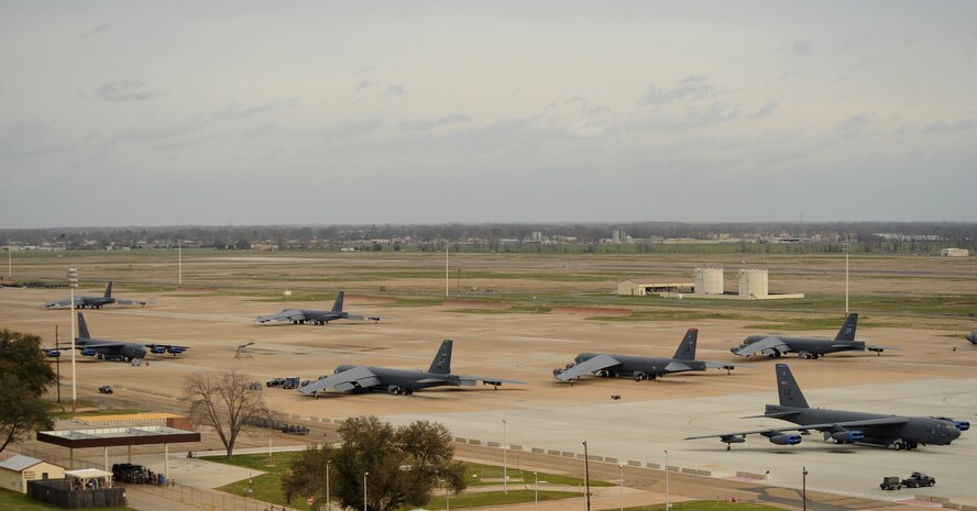 Several B-52H Stratofortress bombers taxi pass parked B-52's on the flightline at Barksdale Air Force Base, La., March 5. Air Traffic Controllers inform the aircrew on weather and flightline conditions and provide take-off clearance. (U.S. Air Force photo/Airman 1st Class Benjamin Gonsier)
