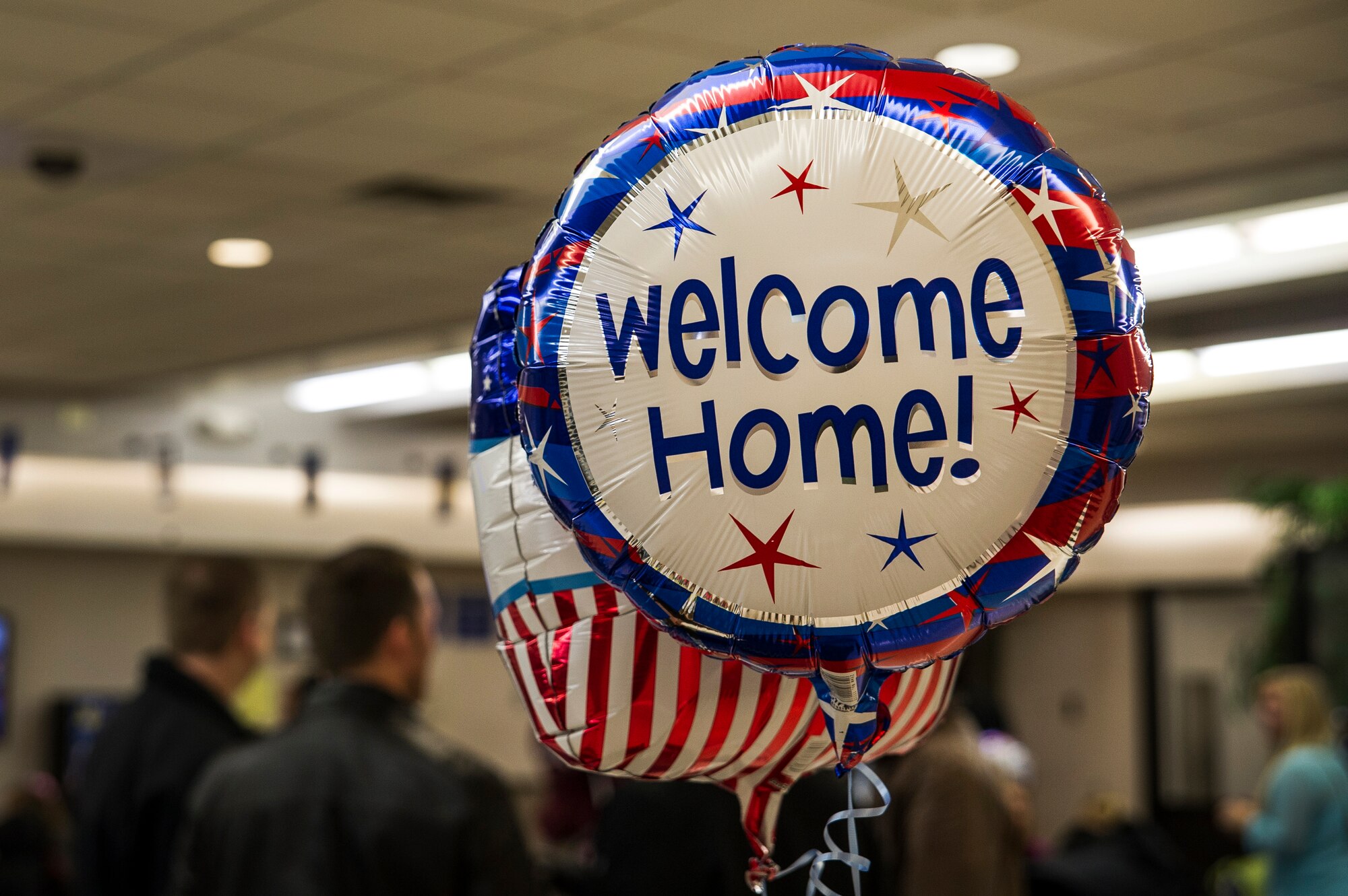 A welcome-home balloon floats in the passenger terminal during the 14th Airlift Squadron redeployment March 3, 2013, at Joint Base Charleston - Air Base, S.C. More than 100 Airmen from the 14th AS returned home from a 120-day deployment to Southwest Asia. (U.S. Air Force photo/ Senior Airman George Goslin)