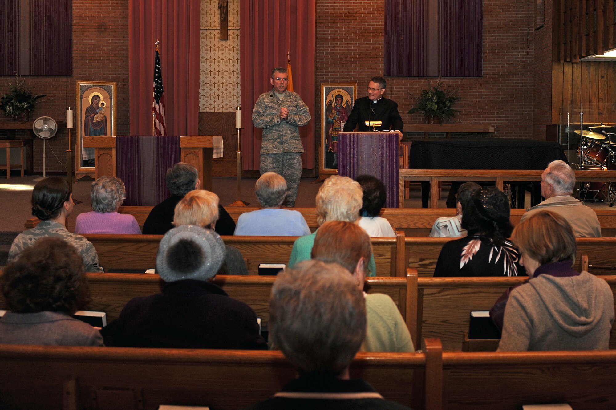 U.S. Air Force Chaplain (Capt.) Jesus Navarette, 4th Fighter Wing chaplain, introduces Timothy Broglio, Military Services archbishop, at the base chapel on Seymour Johnson Air Force Base, N.C., Feb. 27, 2013. Broglio is the fourth archbishop to serve for the military services. (U.S. Air Force photo/Airman 1st Class John Nieves Camacho/Released)
