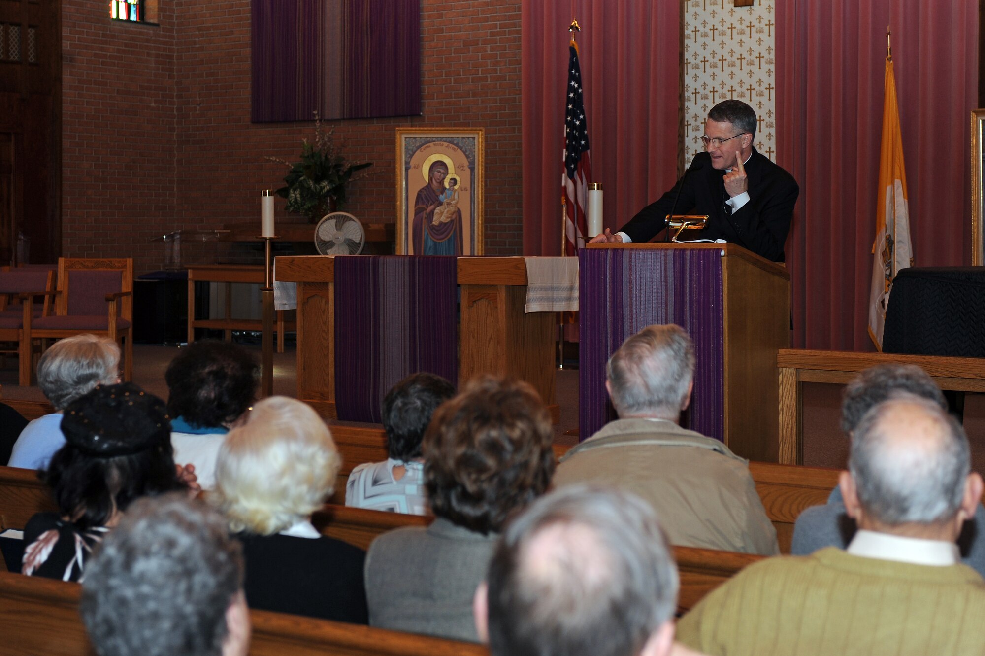 Timothy Broglio, Military Services archbishop, speaks to members of the Catholic community at the base chapel on Seymour Johnson Air Force Base, N.C., Feb. 27, 2013. Broglio came to base for a pastoral visit and to reflect with gatherers on Lent. (U.S. Air Force photo/Airman 1st Class John Nieves Camacho/Released)