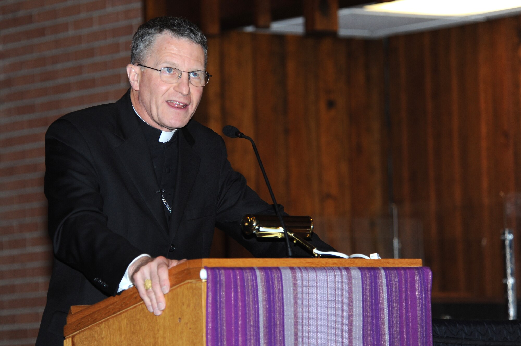 Timothy Broglio, Military Services archbishop, delivers a speech to members of the Catholic community at the base chapel on Seymour Johnson Air Force Base, N.C., Feb. 27, 2013.  Broglio spoke on the history and importance of Ash Wednesday, Lent and Easter. (U.S. Air Force photo/Airman 1st Class John Nieves Camacho/Released)
