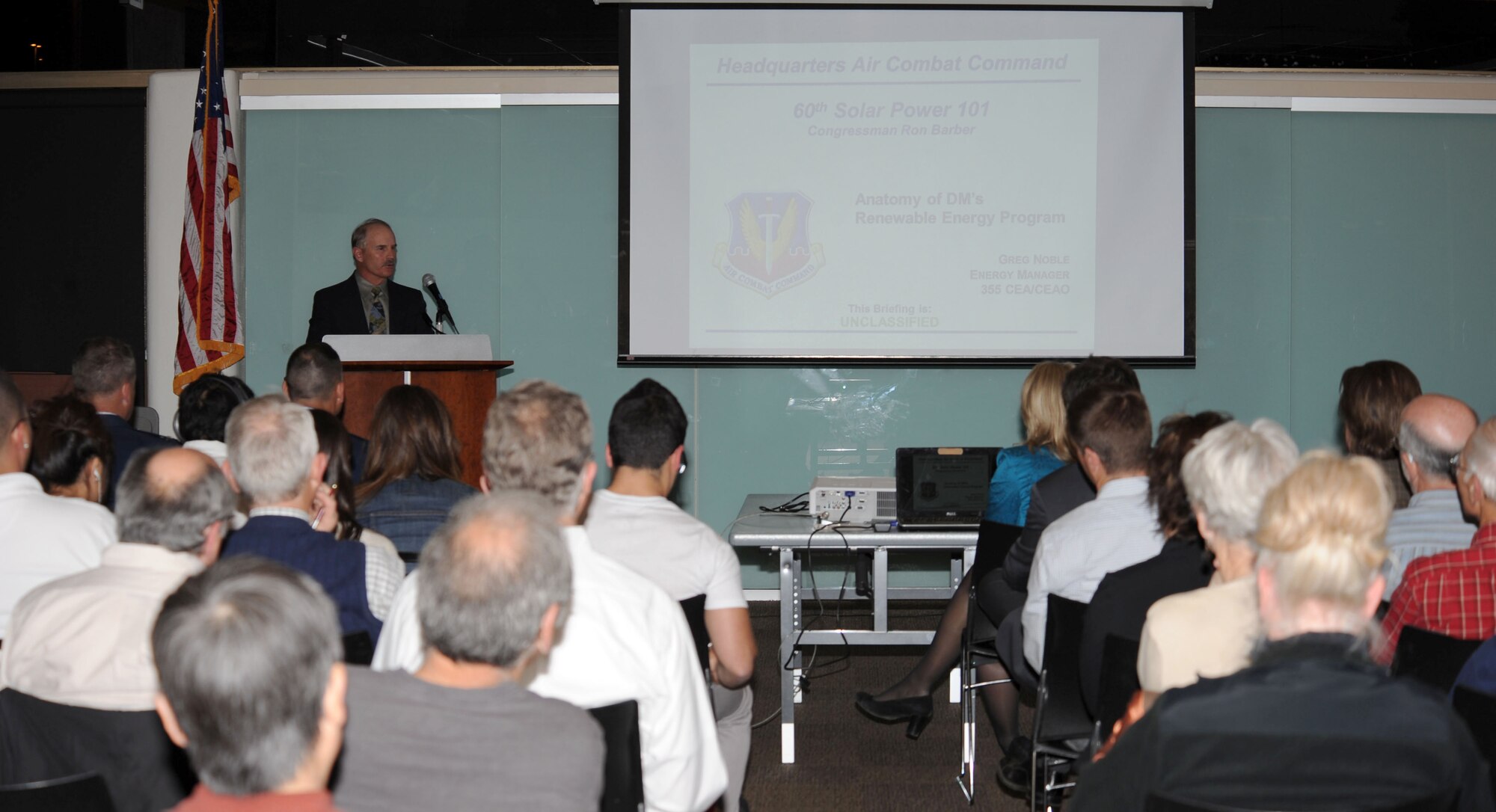 Greg Noble, 355th Civil Engineer Squadron energy manager, speaks at the 60th Solar 101 at the Wilmot-Murphy Branch Library in Tucson, Ariz., Feb. 19, 2013. Noble explained to the event's attendees the programs implemented by Davis-Monthan Air Force Base to reduce energy costs via use of renewable energy sources. (U.S. Air Force photo by Senior Airman Timothy Moore/Released)