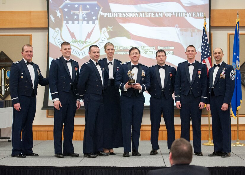 Members of the 341 Operations Support Squadron Emergency War Order Flight accept the award for Professional Team of the Year. The 341st OSS competed against seven teams. (U.S. Air Force photo/Beau Wade)