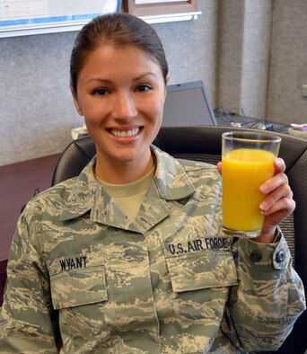 Tech. Sgt. Anna-Marie Wyant tried something new and learned that simple things such as a cup of orange juice and a smile can make a big difference. (U.S. Air Force photo/Senior Airman Natasha Dowridge)
