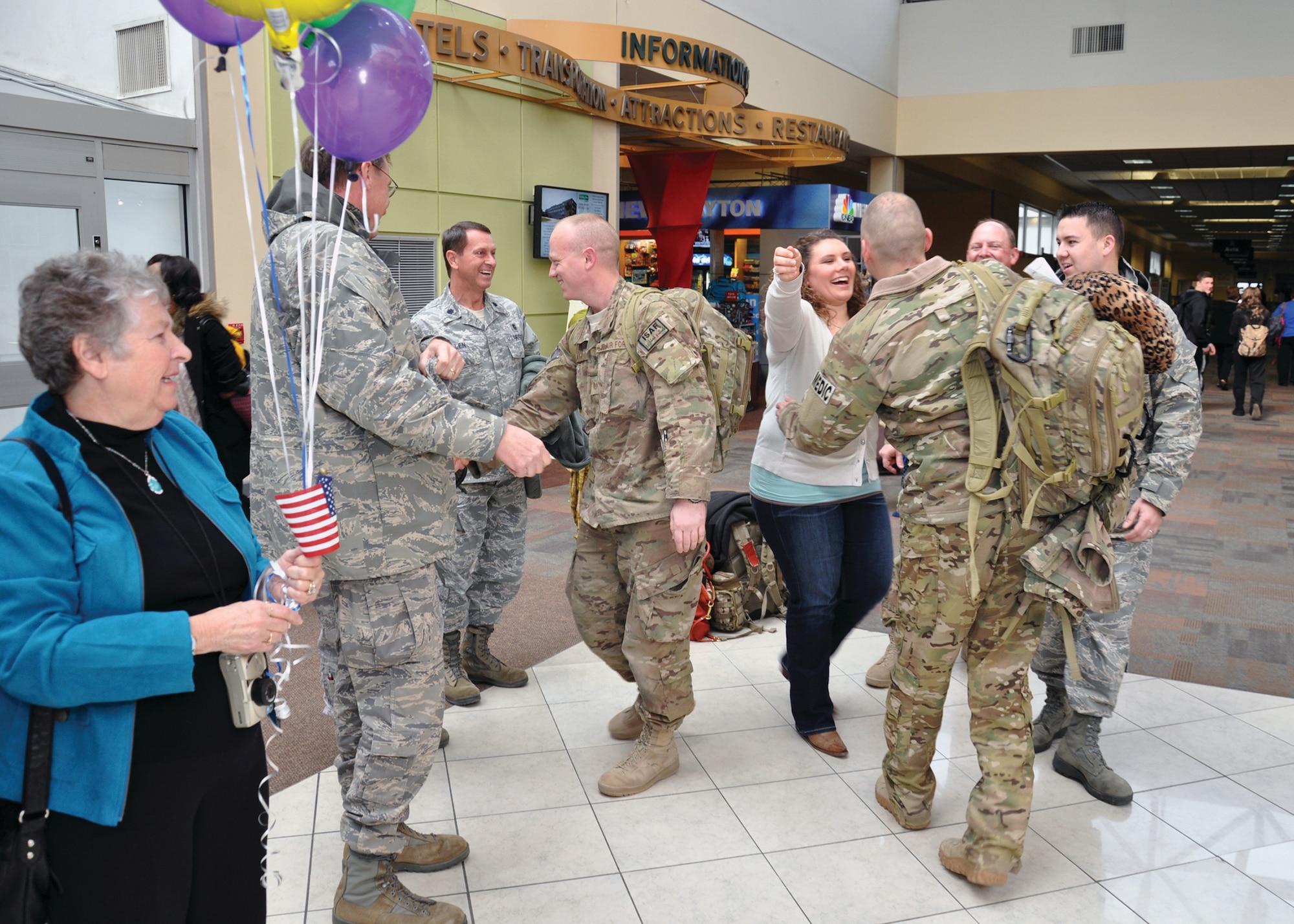 WRIGHT-PATTERSON AIR FORCE BASE, Ohio - Family, friends and members of the 445th Airlift Wing welcome home Airmen of the 445th Aeromedical Evacuation Squadron returning from a deployment to Southwest Asia at the Dayton International Airport Feb. 10. (U.S. Air Force photo/Senior Airman Matthew Cook)