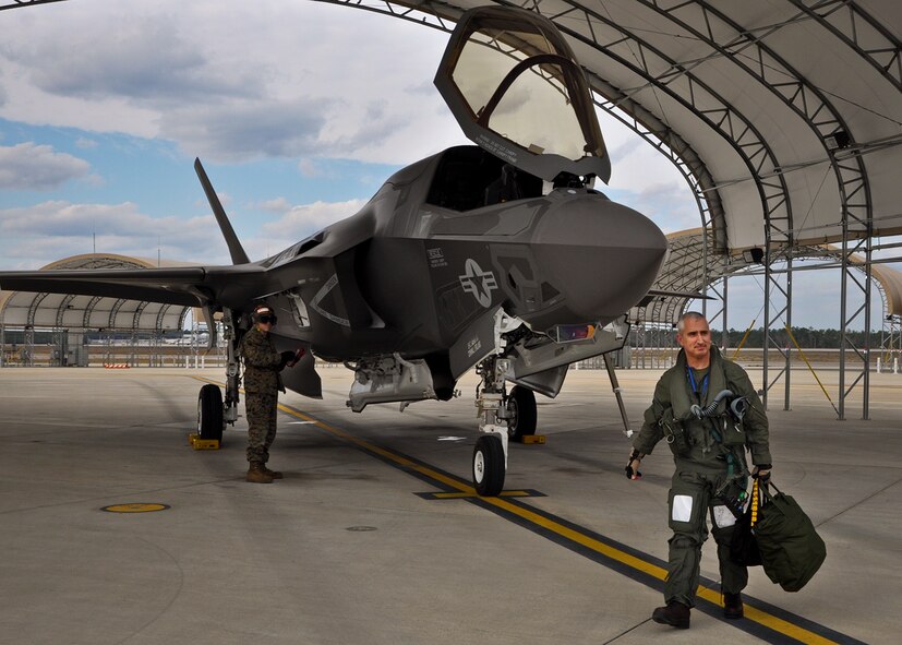 Marine Col. Arthur Tomassetti, the 33rd Fighter Wing vice commander, walks away from his F-35B Lightning II after a sortie March 1.  F-35 A and B operations began again March 1 at Eglin Air Force Base, Fla., after a two-week cautionary suspension grounded the aircraft. An engine blade crack discovered at Edwards Air Force Base, Calif. Feb. 19 caused the recent suspension.(U.S. Air Force photo/Maj. Karen Roganov)