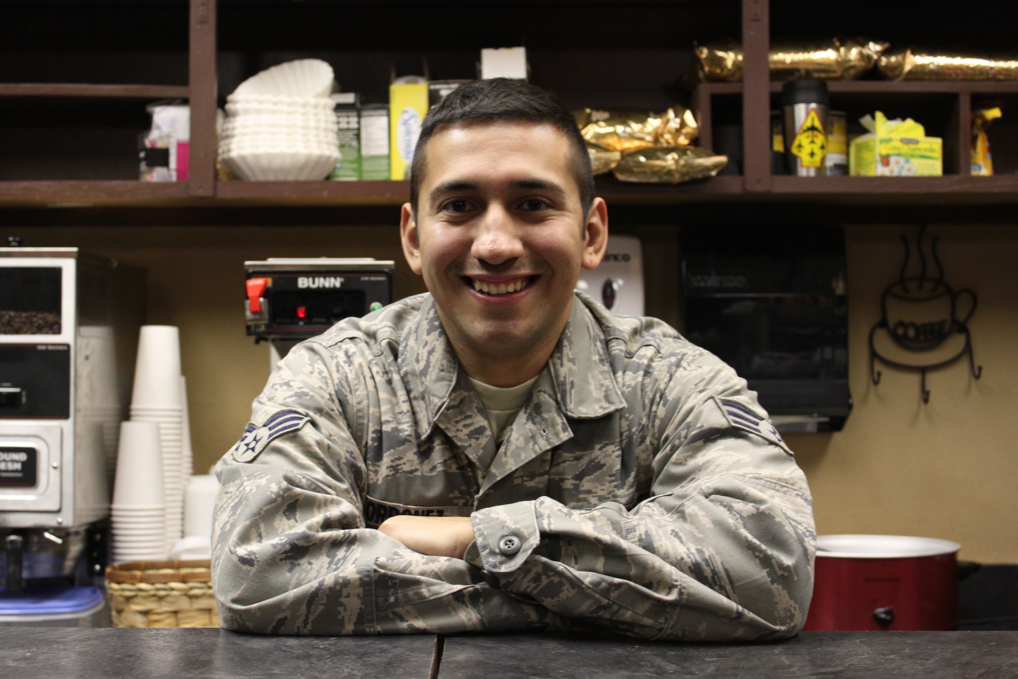 Senior Airman Johnny Ordonez poses in his new Mexican style restaurant. Ordonez, a reservist here in the 507th  Aircraft Maintenance Squadron partnered with his family and opened the La Fonda Café in December. 