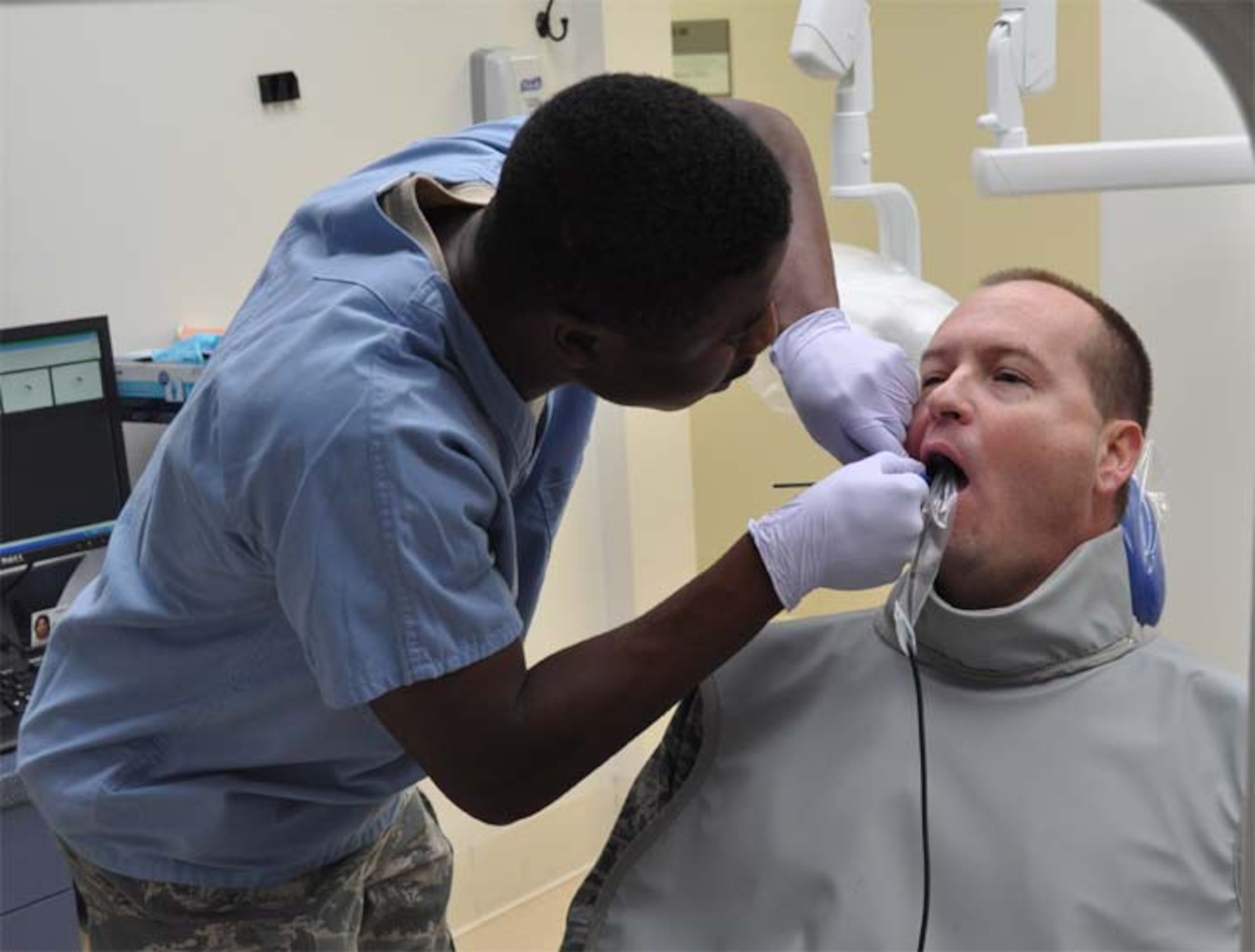 Lt. Col. James Clutter, 916th Civil Engineer commander, ensures he is ready to deploy with an regular dental checkup at the 916th Aerospace Medicine Squadron. Are you ready to deploy? (USAF photo by Maj. Erin Karl, 916ARW/PA)