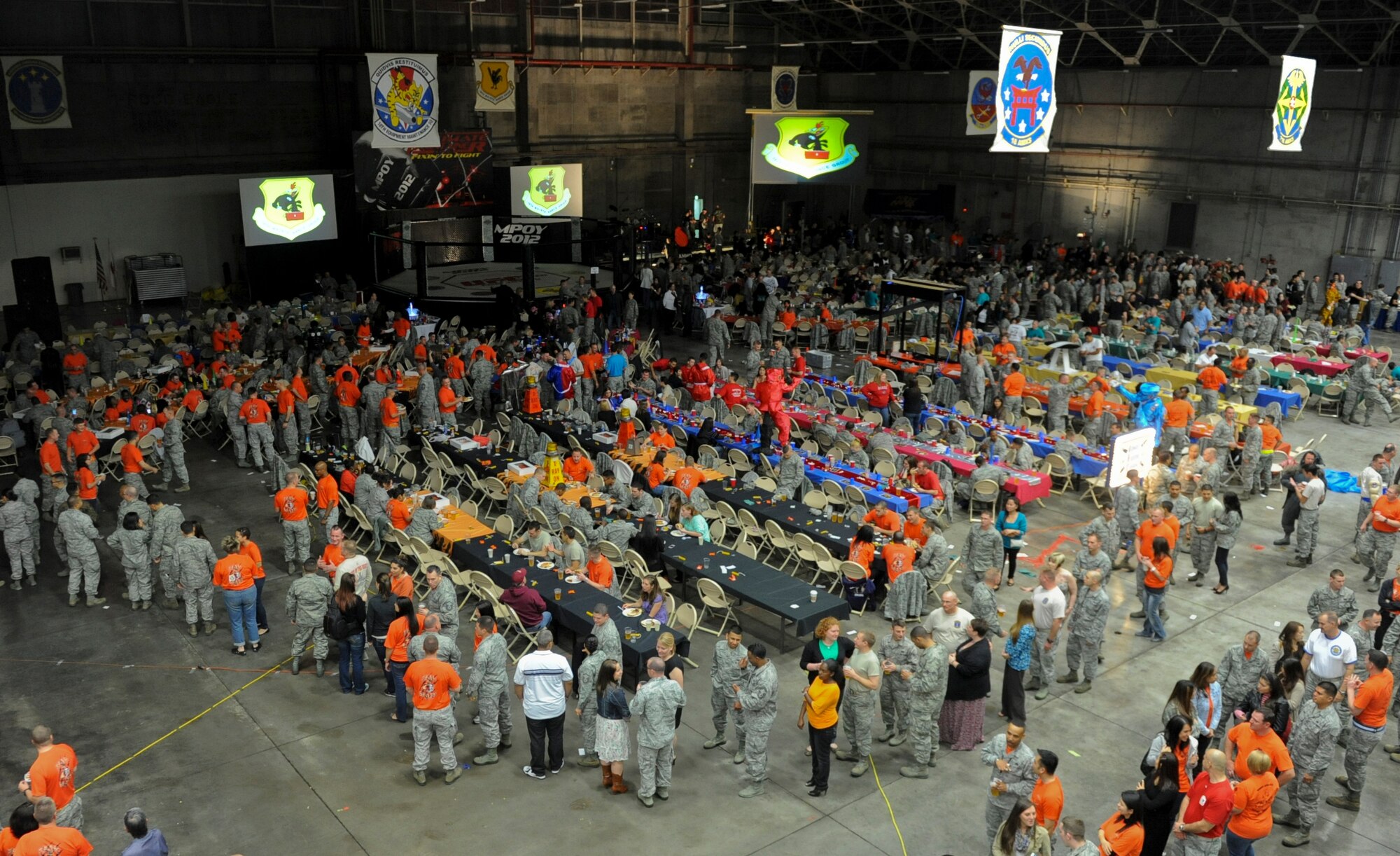 U.S. Air Force Airmen from the 18th Maintenance Group gather together during the Maintenance Professional of the Year banquet on Kadena Air Base, Japan, March 2, 2013. The banquet highlighted the contributions, hard work and accomplishments of Airmen, who went above and beyond the standards during 2012. (U.S. Air Force/Airman 1st Class Justin Veazie)