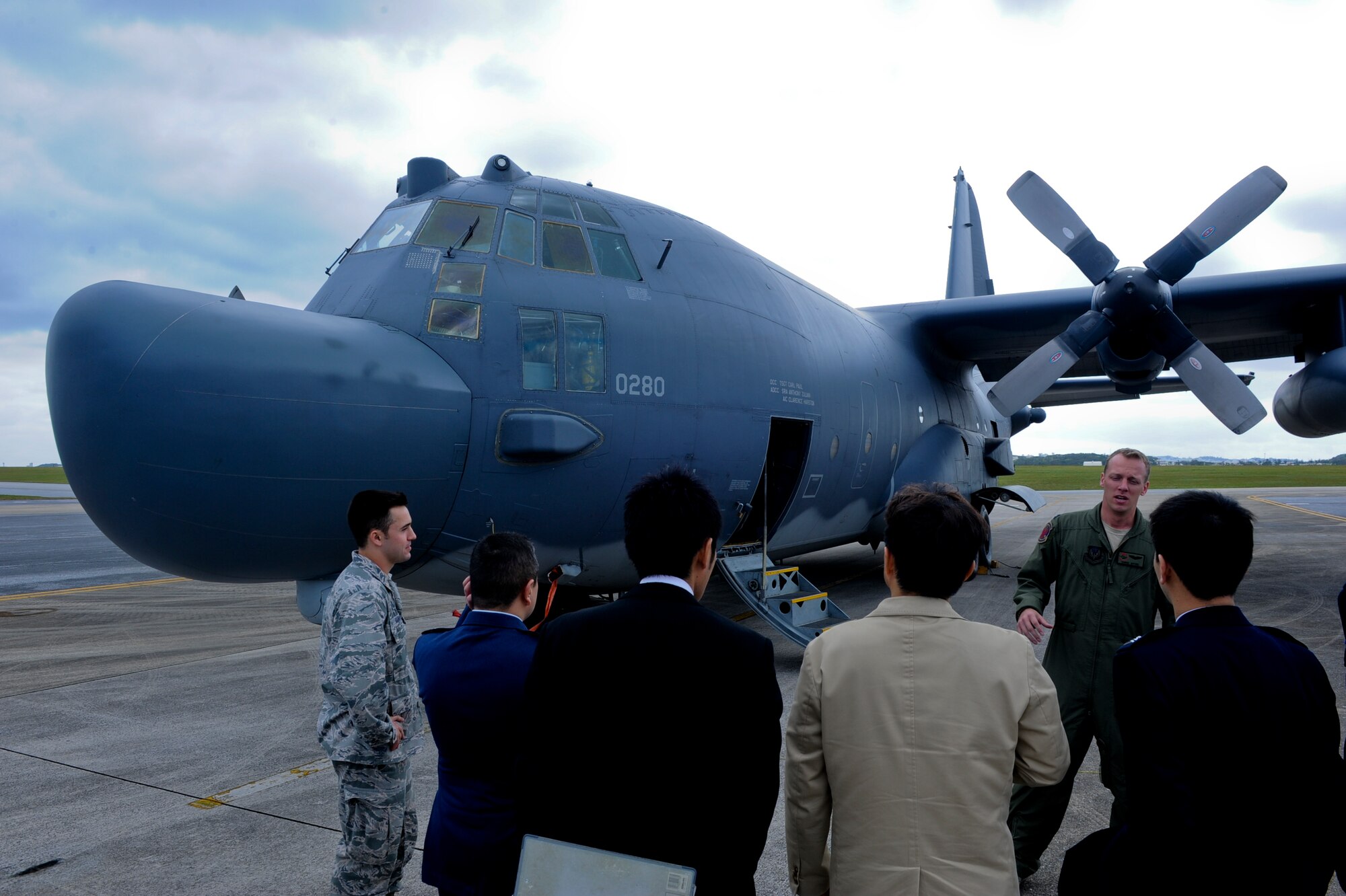 U.S. Air Force Capt. Chris Nitzel, 353rd Special Operation Group Lockheed MC-130H Combat Talon II electronic warfare officer instructor, briefs Japan Air Self Defense Force personnel on some of the functions of the Talon during a JASDF visit on Kadena Air Base, Japan, Feb. 26, 2013. The Talon provides infiltration, exfiltration and resupply of special operations forces and equipment in hostile or denied territory. (U.S. Air Force photo/Airman 1st Class Justin Veazie)