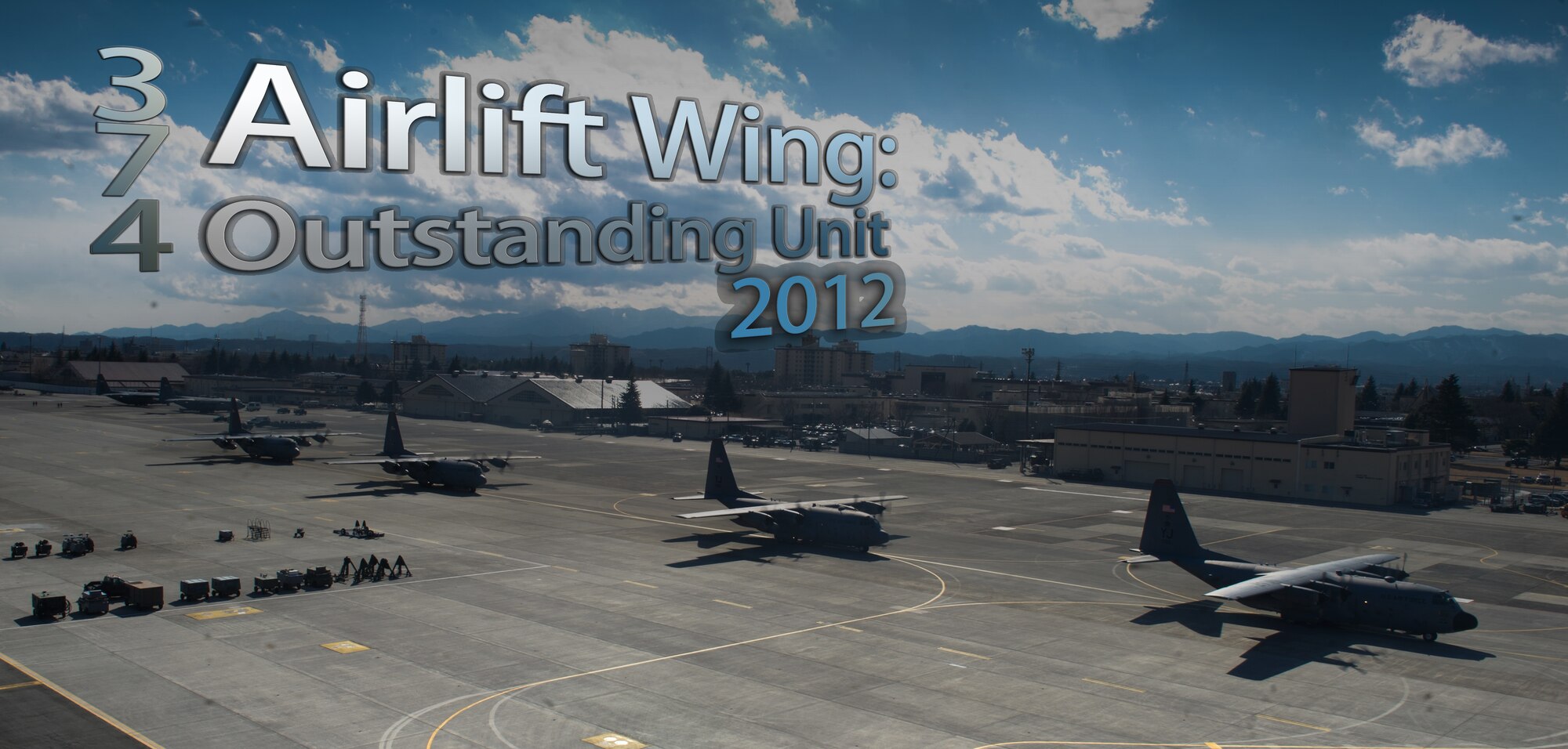 The 374th Airlift Wing earned the 2012 Air Force Outstanding Unit Award for Nov. 2, 2011 through Nov. 1, 2012. (U.S. Air Force illustration by Senior Airman Cody H. Ramirez)