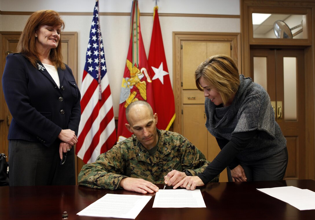 Brig. Gen. Thomas Gorry, commanding general Marine Corps Installations East – Marine Corps Base Camp Lejeune, recently re-signed his new lease with Atlantic Marine Corps Communities representatives as part of the Resident Energy Conservation Program. RECP is a Department of Navy initiative that encourages conservation of utilities in public private housing on base. All service members residing in AMCC homes are required to sign a new lease by February 1, 2013, if the resident moved in before October 15, 2012.