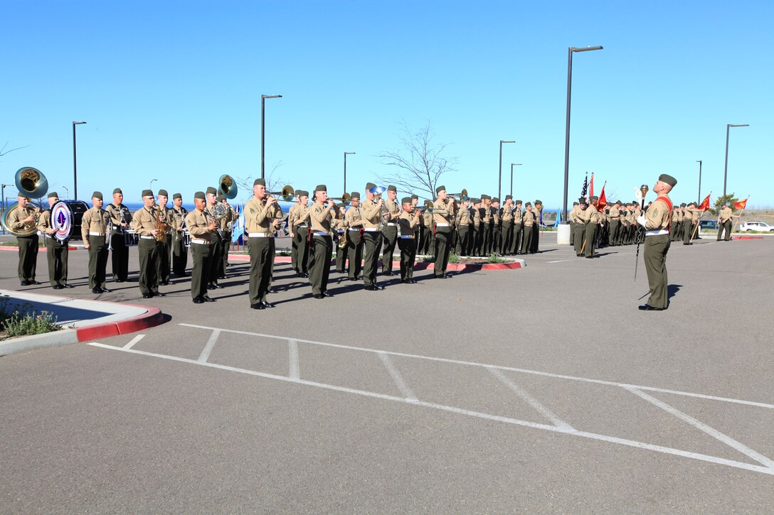 Marines with the 1st Marine Division Band perform for the 1st Marine Special Operations Battalion, U.S. Marine Corps Forces Special Operations Command change of command ceremony at Camp Pendleton, Calif., March 1. Lt. Col. Michael A. Brooks, the commanding officer of 1st MSOB, relinquished command to Lt. Col. John J. Lynch in front of the battalion headquarters building.
