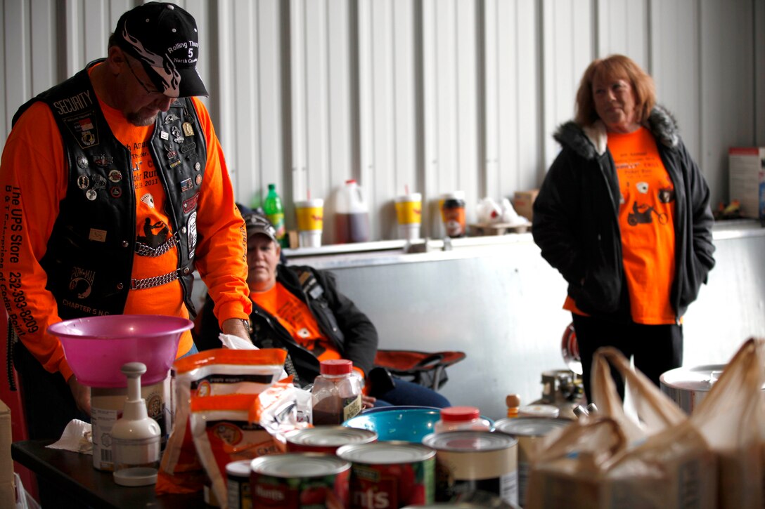 Rolling Thunder Chapter N.C.-5 volunteers prepare chili for the 11th Annual Chilly Chili Poker Run starting Jacksonville Feb. 16. There were four total stops in the poker run, and patrons collected a card at each stop. Their last card was collected upon returning to the starting point, with the best hand winning first place.