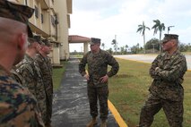 Maj. Gen. James A. Kessler, Commanding General of Marine Corps Installations Command, talks with senior leaders of exercise Guahan Shield Feb.13. Kessler's visit was part of a tour of Guam with his Air Force counterpart, Maj. Gen. Timothy A. Byers, the Civil Engineer with Headquarters United States Air Force, regarding issues associated with the Defense Policy Review Initiative.