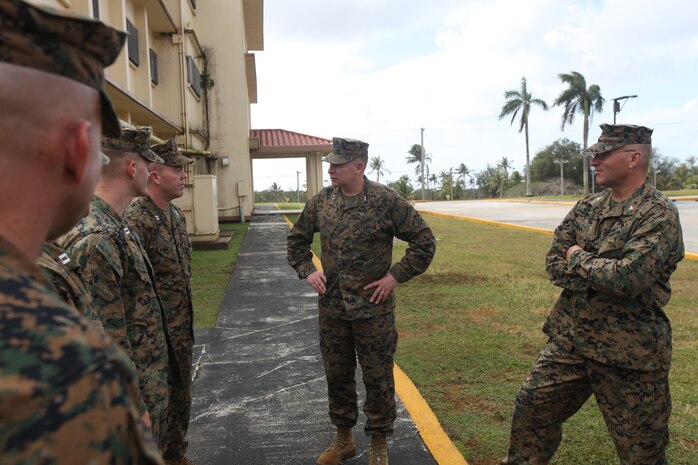 Maj. Gen. James A. Kessler, Commanding General of Marine Corps Installations Command, talks with senior leaders of exercise Guahan Shield Feb.13. Kessler's visit was part of a tour of Guam with his Air Force counterpart, Maj. Gen. Timothy A. Byers, the Civil Engineer with Headquarters United States Air Force, regarding issues associated with the Defense Policy Review Initiative.