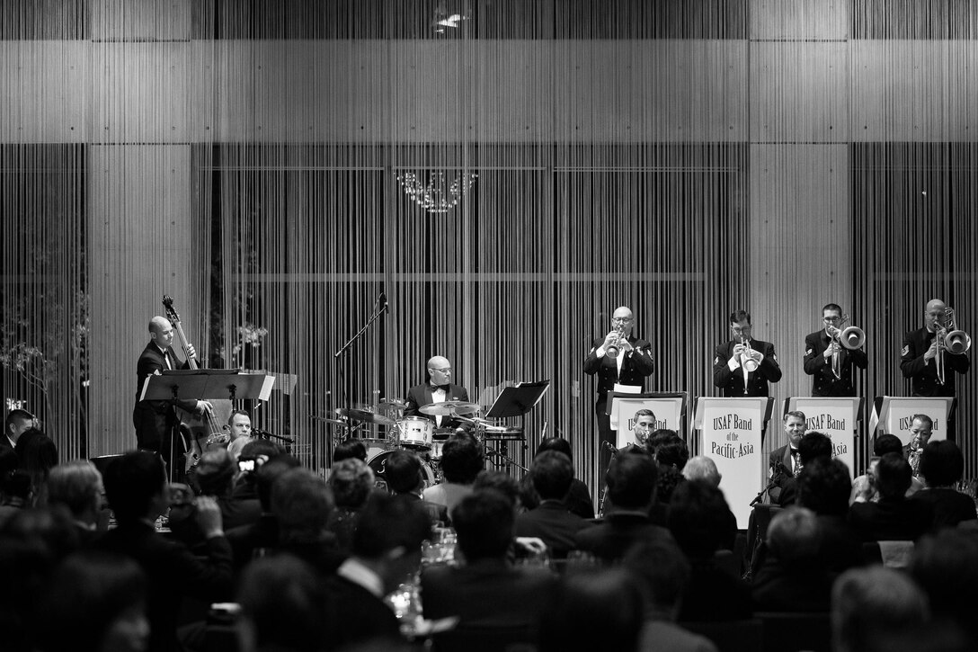 TOKYO, Japan -- Pacific Showcase, U.S. Air Force Band of the Pacific-Asia jazz ensemble, performs a selection of Glenn Miller hits and Japanese folk songs at the Glenn Miller Birthplace Society Japan Branch 20th anniversary celebration, Tokyo American Club, Tokyo, Japan, March 1, 2013. The society has served as a musical bridge between the U.S. and Japan since its creation. (U.S. Air Force photo by Staff Sgt. Josh Voyles)