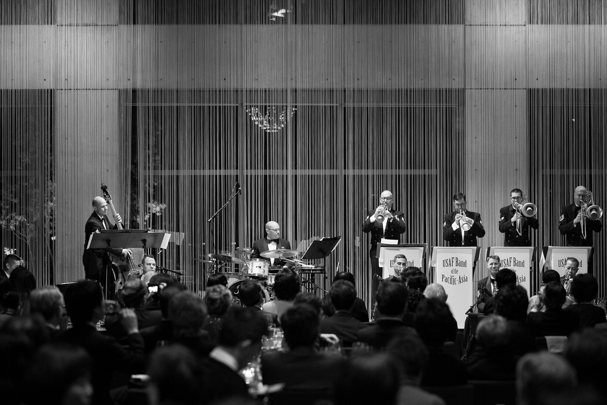 TOKYO, Japan -- Pacific Showcase, U.S. Air Force Band of the Pacific-Asia jazz ensemble, performs a selection of Glenn Miller hits and Japanese folk songs at the Glenn Miller Birthplace Society Japan Branch 20th anniversary celebration, Tokyo American Club, Tokyo, Japan, March 1, 2013. The society has served as a musical bridge between the U.S. and Japan since its creation. (U.S. Air Force photo by Staff Sgt. Josh Voyles)