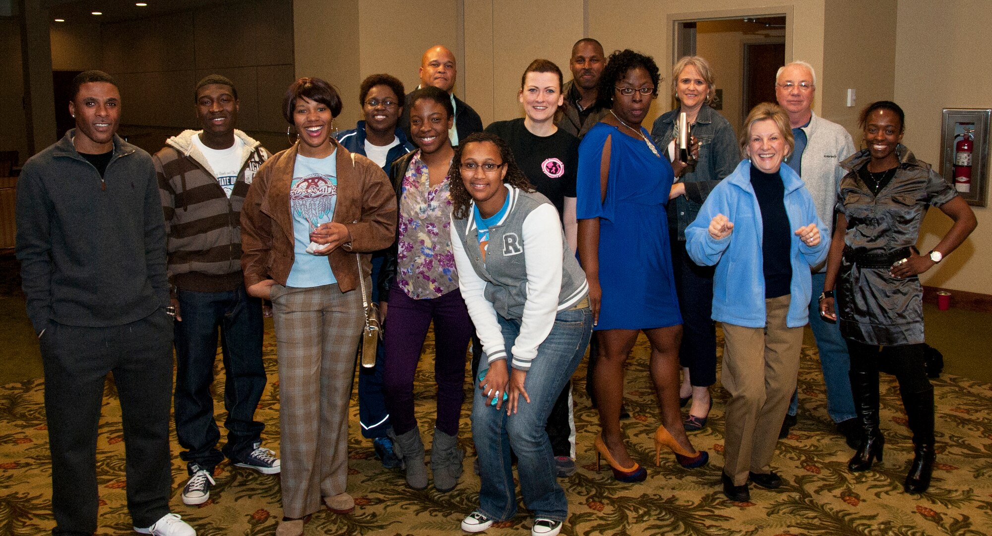 3/2/2013 – KEESLER AIR FORCE BASE, Miss. – Members of the 403rd Aeromedical Staging Squadron pose for a group shot for "That 70's Party" at the Bay Breeze Event Center here March 2, 2013. "That 70's Party" was hosted by the 403rd ASTS Rising 6 as a social gathering so that members can relax and enjoy an evening together. (U.S. Air Force photo/Senior Airman L. Chris DeBlanc)