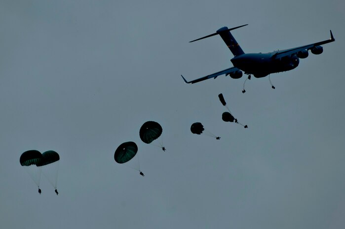 U.S. Army Soldiers from the 1st 321st Airborne Artillery Regiment from Fort Bragg, N.C., jump from a C-17 Globemaster from Charleston Air Force Base, S.C., over Sicily Air Field during a 1,700 parachute Joint Operational Access Exercise Feb. 25, 2013, at Fort Bragg, N.C. Soldiers participating in the exercise simulate the seizure of an airfield. (U.S. Air Force photo by Senior Airman Daniel Hughes)