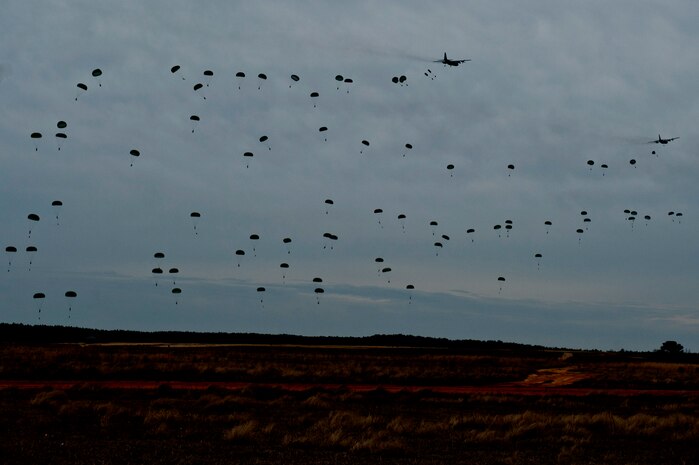 U.S. Army Soldiers from the 1st 321st Airborne Artillery Regiment from Fort Bragg, N.C., jump from a C-130 Hercules from Pope Air Force Base, N.C., over Sicily Air Field during a 1,700 parachute Joint Operational Access Exercise Feb. 25, 2013, at Fort Bragg, N.C. This was the practice run for the main event. (U.S. Air Force photo by Senior Airman Daniel Hughes)