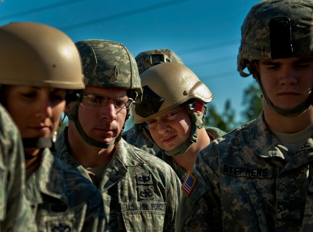 U.S. Air Force Staff Sgt. Daniel Franklin, 820th Rapid Engineer Deployable Heavy Operational Repair Squadron Engineers Airborne from Nellis Air Force Base, Nev., watches a T-11 parachute training class with fellow RED HORSE Airmen and Soldiers from the 82nd Airborne Brigade, Feb. 21, 2013, at Fort Bragg, N.C. The T-11 parachute is the newest parachute used by the U.S. Armed Forces. (U.S. Air Force photo by Senior Airman Daniel Hughes)
