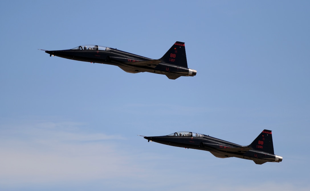 Two T-38 Talon jet trainer aircraft climb skyward at Beale Air Force Base, Calif., Feb. 28, 2013. The Talon can climb from sea level to 30,000 feet in one minute. (U.S. Air Force photo by Staff Sgt. Robert M. Trujillo/Released)