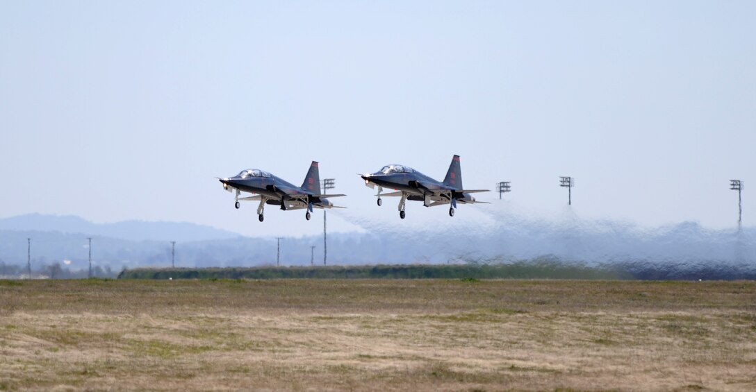 Two T-38 Talon jet trainer aircraft take off at Beale Air Force Base, Calif., Feb. 28, 2013. The Talon first flew in 1959. (U.S. Air Force photo by Staff Sgt. Robert M. Trujillo/Released)