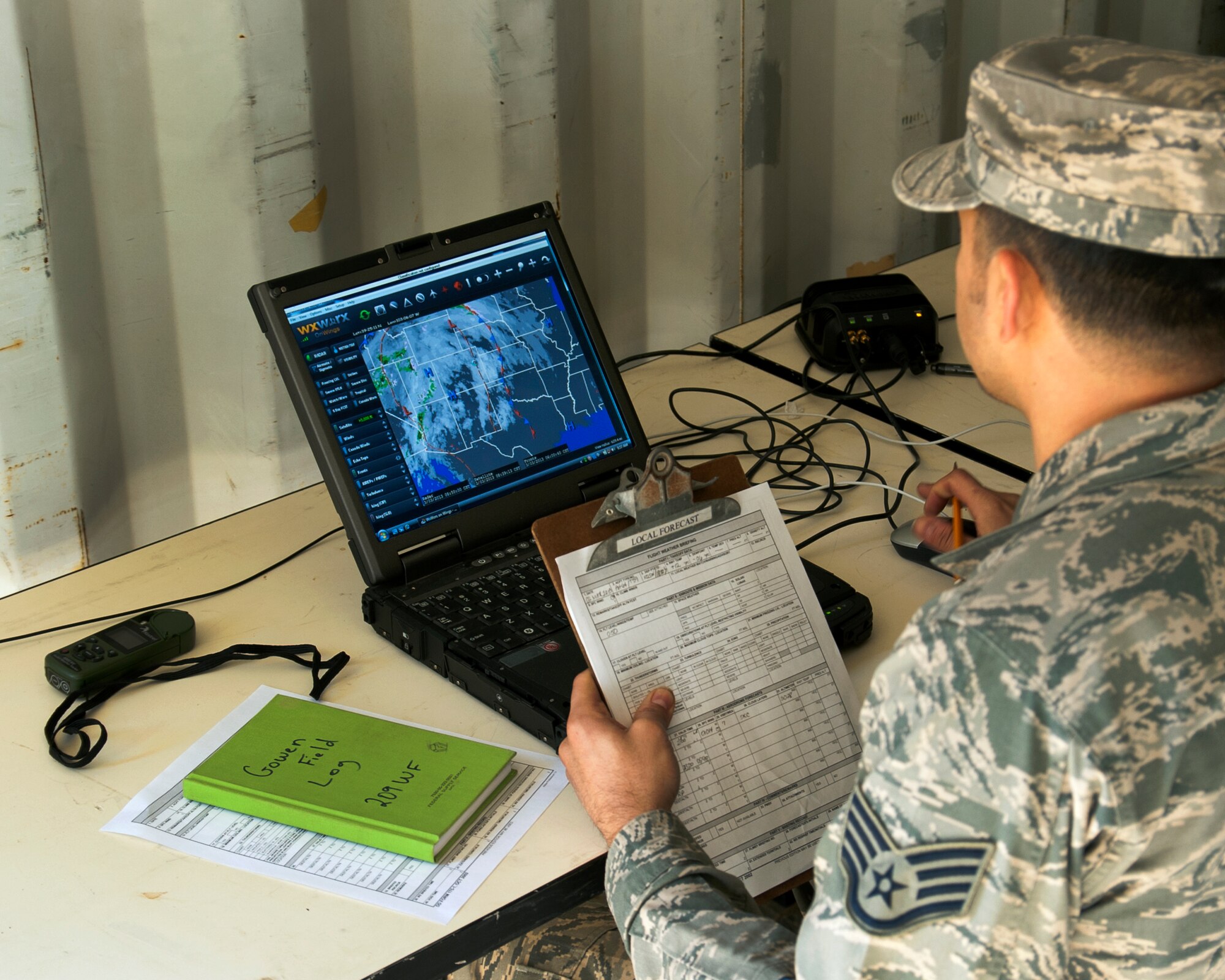 Staff Sgt. Angel Franco, a member of the Texas Air National Guard's 209th Weather Flight, based at Camp Mabry, in Austin, Texas, particiates in weather training at Camp Swift, near Bastrop, March 2-3, 2013. The training is part of an annual requirement. (National Guard photo by Air Force Staff Sgt. Phil Fountain / Released)