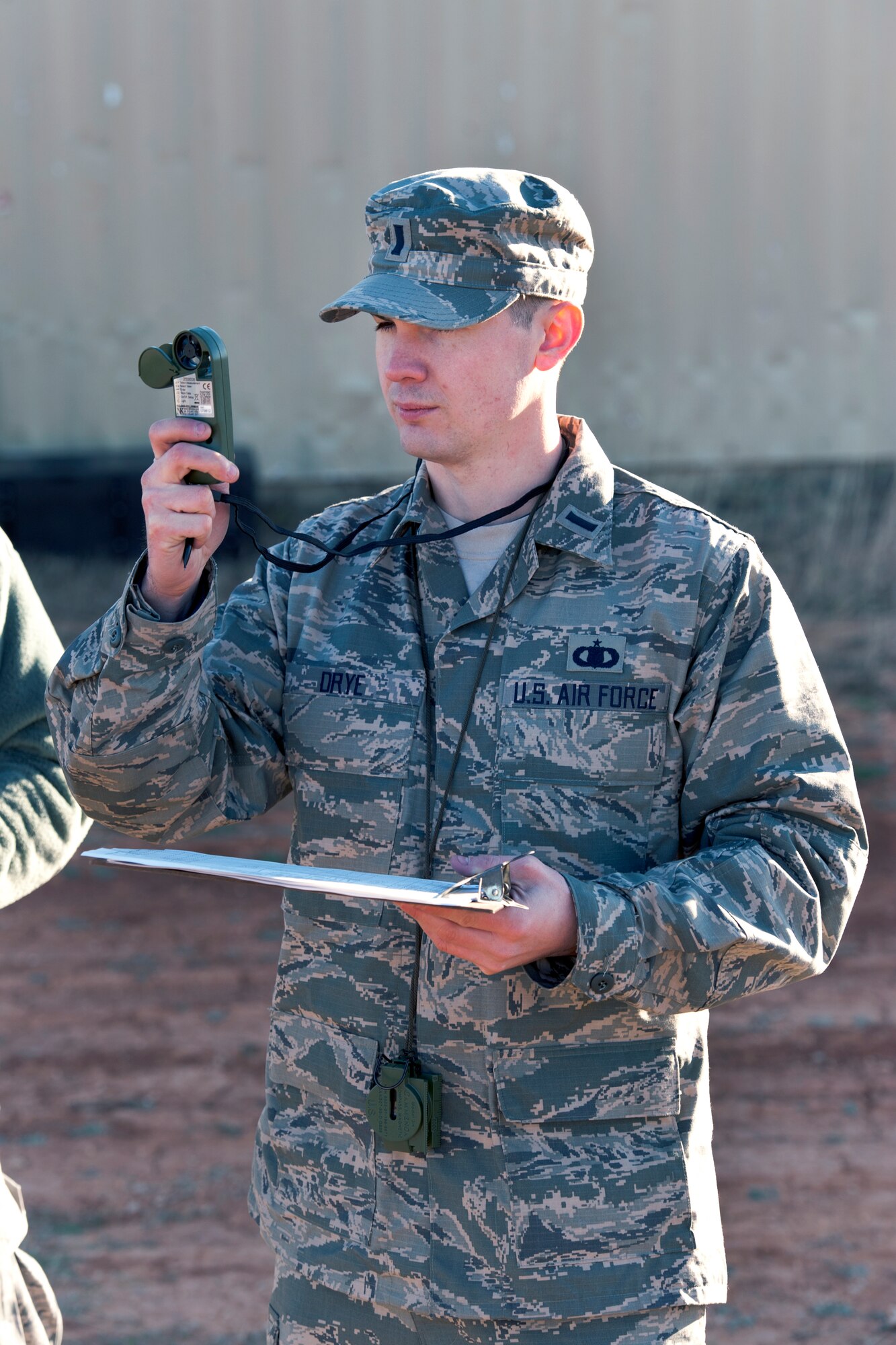 1st Lt. Christopher L. Drye, a member of the Texas Air National Guard's 209th Weather Flight, based at Camp Mabry, in Austin, Texas, uses a pocket weather tracker during training at Camp Swift, near Bastrop, March 3, 2013. The training is part of an annual requirement. (National Guard photo by Air Force Staff Sgt. Phil Fountain / Released)