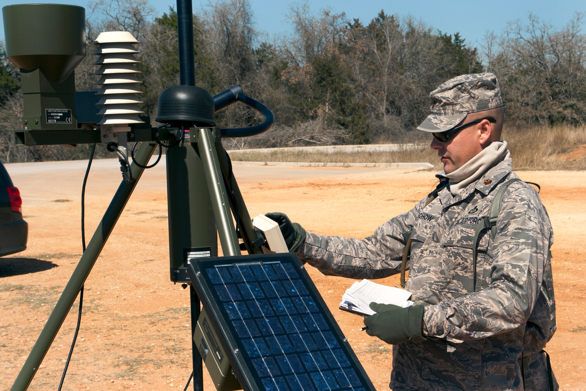 Maj. Paul E. Buschow of Hutto, Texas, commander of the Texas Air National Guard's 209th Weather Flight, based at Camp Mabry, in Austin, Texas, participates in weather training at Camp Swift, near Bastrop, March 2, 2013. The training is part of an annual requirement. (National Guard photo by Air Force Staff Sgt. Phil Fountain / Released)
