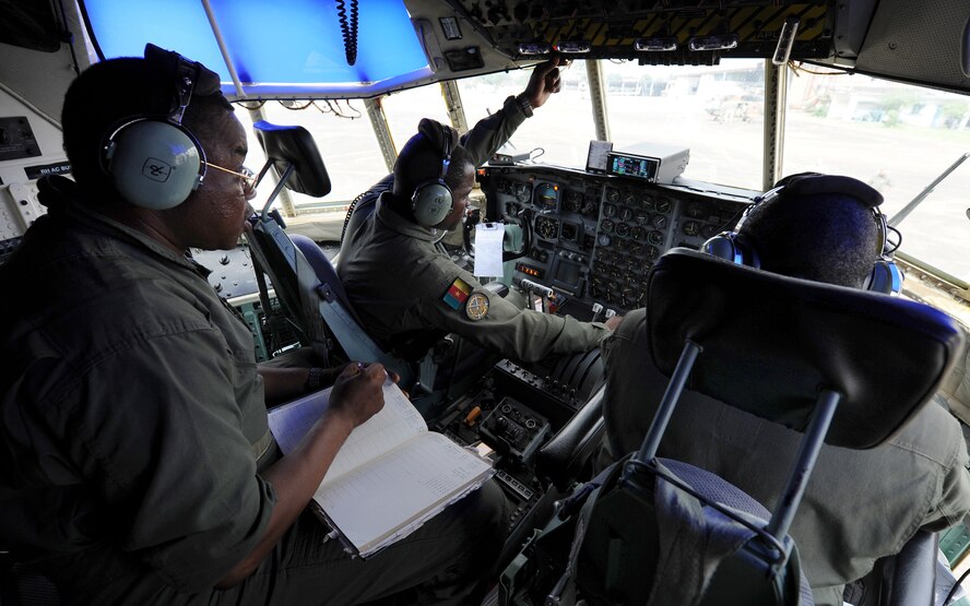 Cameroon Air Force C-130 aircrew members conduct preflight checks prior to taking off to perform a low-cost low-altitude bundle air drop during Central Accord 2013, at Douala Air Force Base, Douala, Cameroon, February 28, 2013. Central Accord 2013 is a joint exercise in which U.S., Cameroon and neighboring Central African militaries partner to promote regional cooperation while increasing aerial resupply and medical readiness capacity. (U.S. Air Force photo/Master Sgt. Stan Parker) 

