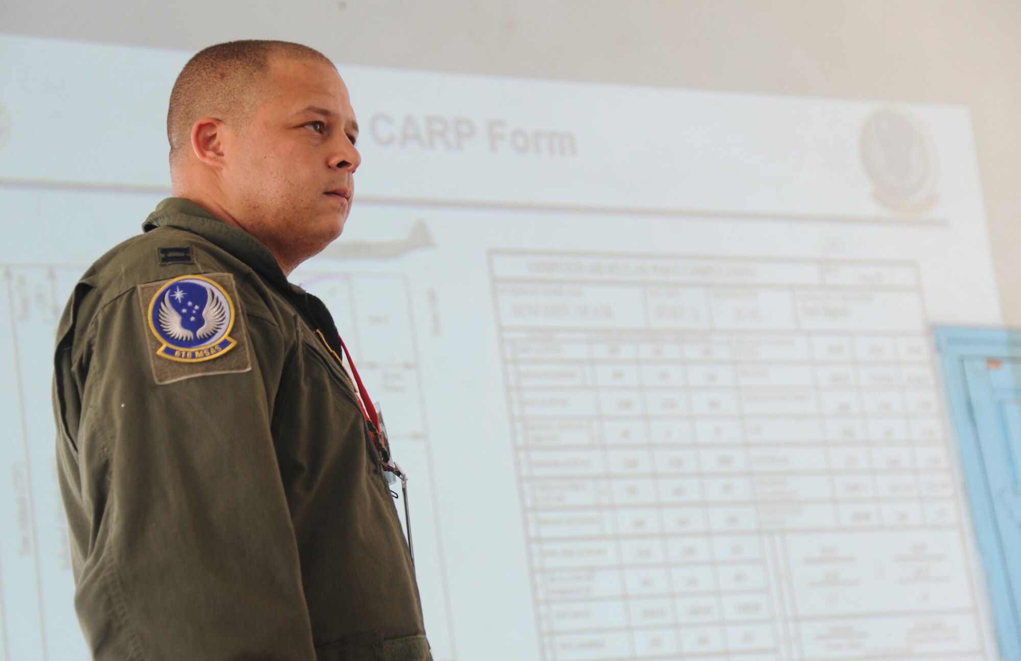 DOUALA, CAMEROON – U.S. Air Force Capt. Mark Lyerly, a C-130 instructor navigator assigned to the Air Mobility Command Test and Evaluation Squadron, Joint Base McGuire-Dix-Lakehurst, N.J. shares his aerial delivery systems experience with Cameroon Air Force personnel during Central Accord 2013, at Douala Air Force Base, Douala, Cameroon, February 21, 2013. Lyerly of Niceville, FL, is participating in Central Accord 2013, a joint exercise in which U.S., Cameroon and neighboring Central African militaries partner to promote regional cooperation while and increasing aerial resupply and medical readiness capacity. (Photo by Master Sgt. MSgt Stan Parker, 621st CRW Public Affairs)